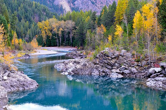 Spring wells up at foot of mountain